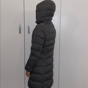 Hooded Uniqlo ultra light down coat.